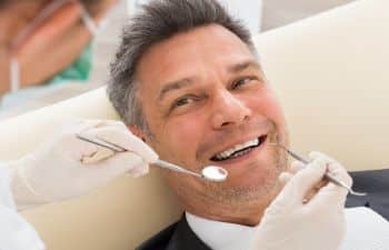 man during the dental checkup